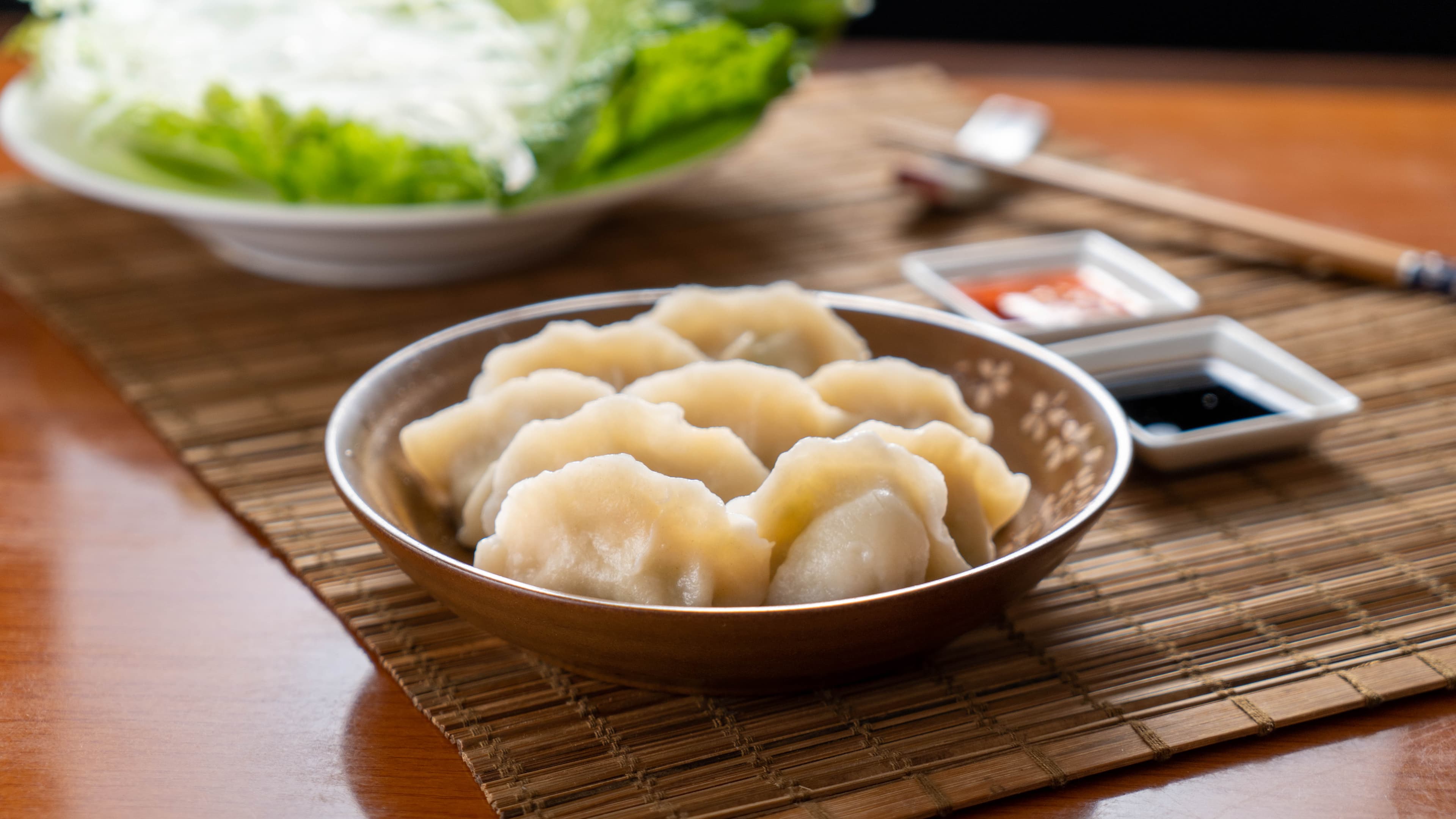 Pork & Napa Cabbage Pork Dumpling - Savory pork-filled dumplings complemented by the freshness of Napa cabbage, offe | Dumpling