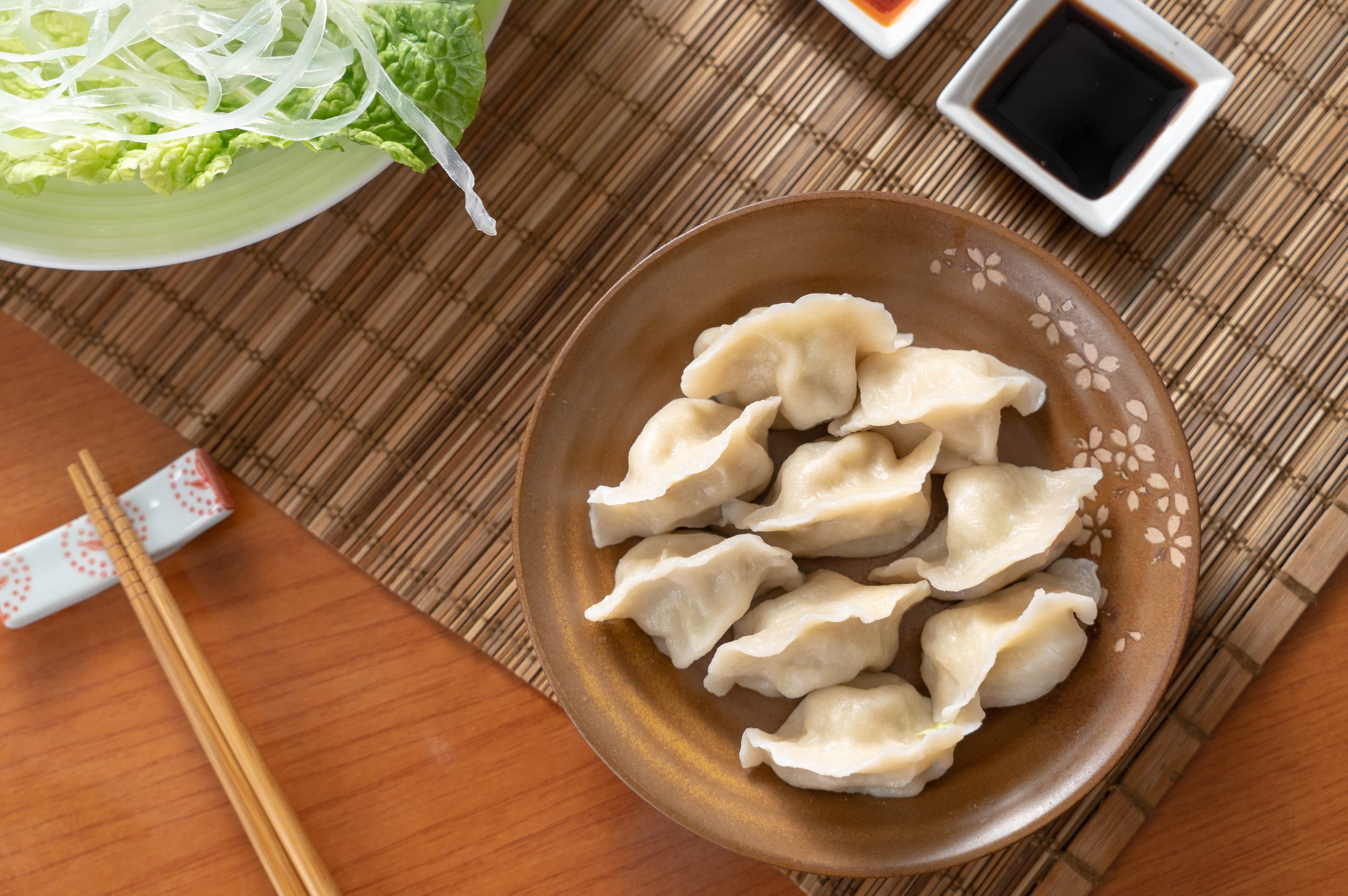 Pork & Chive Dumpling - Succulent pork dumplings enhanced with the vibrant and aromatic taste of chives, | Dumpling
