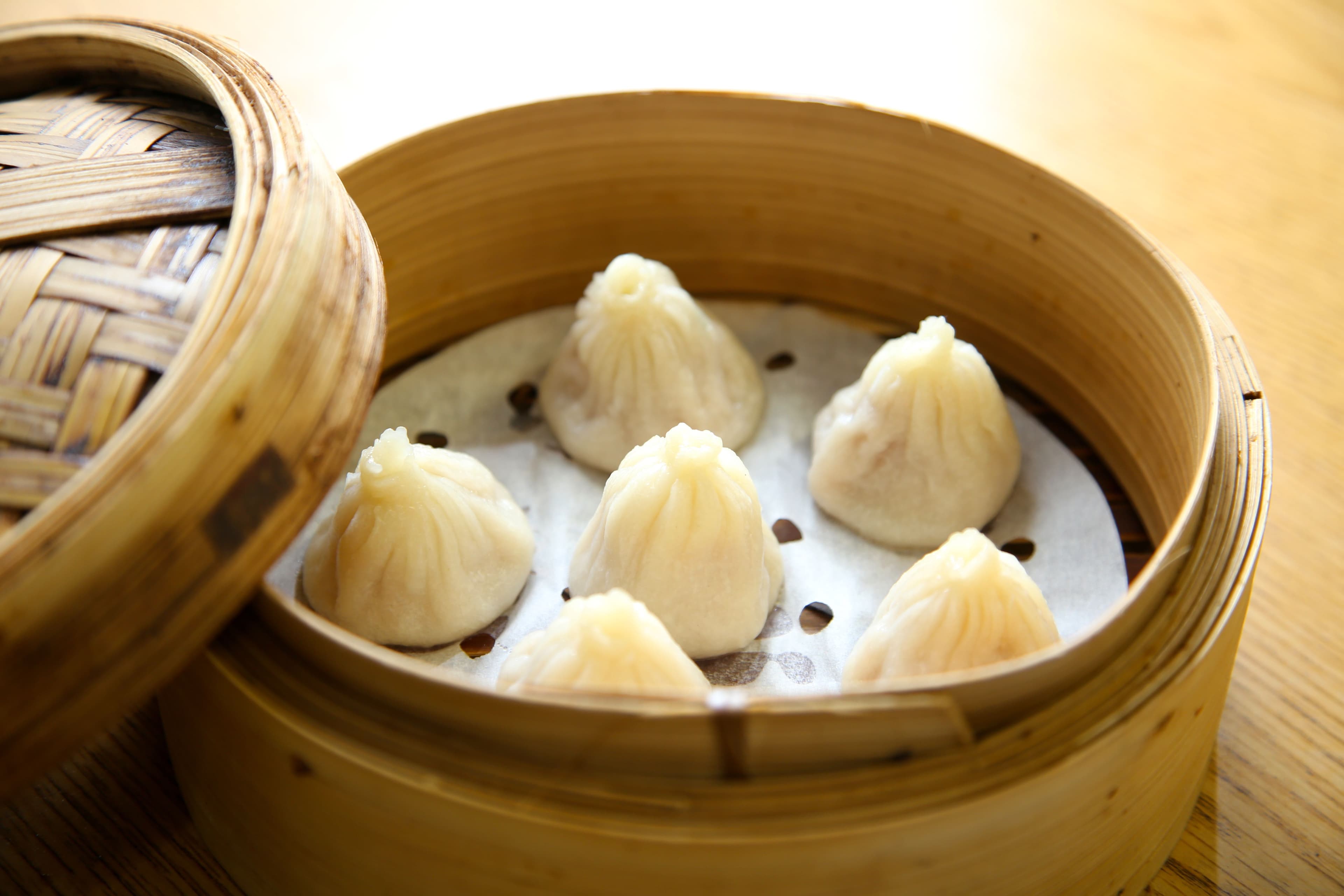Shanghai Pork Soup Dumpling - Delicate steamed dumplings filled with broth and minced pork. A classic Shanghai | Dim Sum