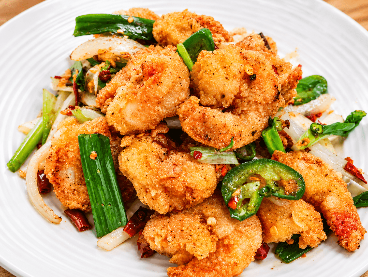 Salt & Pepper Shrimp - Tender battered shrimp seasoned with a flavorful blend of salt, pepper, and spic | Seafood